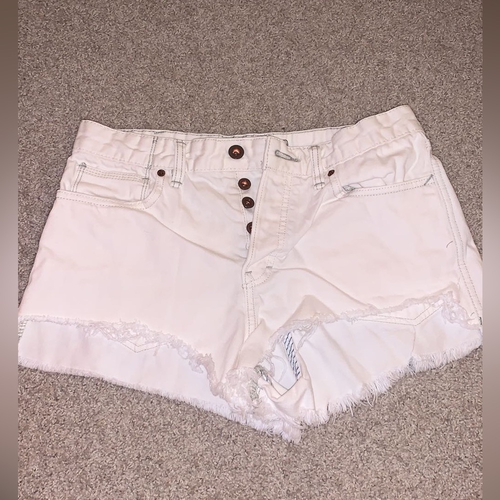White distressed free people high waisted shorts size 28!